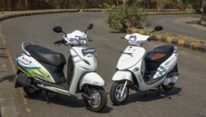 Honda Activa Lavato CNG vs Hero Electric Photon: कौन सा स्कूटर आपके लिए सस्ता और पर्यावरण-अनुकूल है